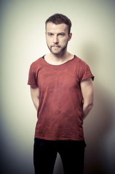vintage portrait of fashion guy on gray background