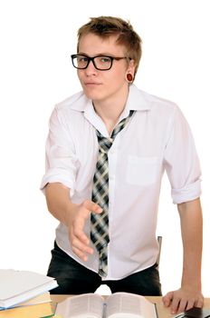 A young man holds out his hand to greet