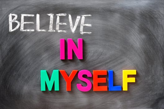 Believe in myself - concept made of colorful letters and chalk writing