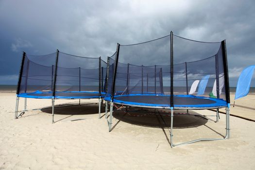 Three rounded trampolines in beach