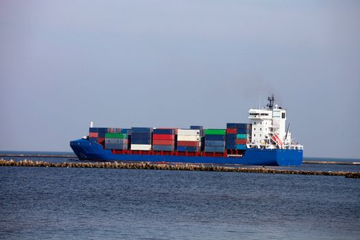 Large container ship leaving harbor