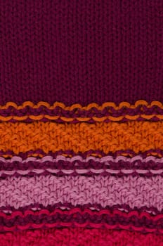 Close up macro background texture of striped knitted texture.