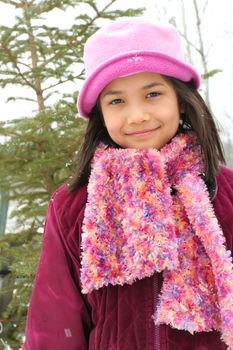 Nine year old girl enjoying winter outdoors