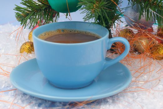 Glass balls, christmas tree and coffee cup