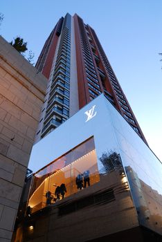 very popular in Japan brand "LouisVutton" shop in  modern architectural environment at  Roppongi Hills, one of the famous Tokyo landmarks