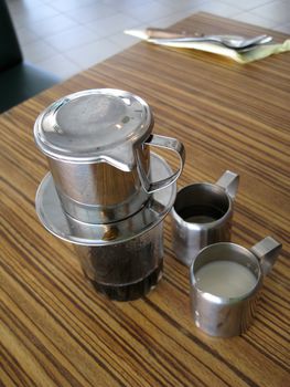 a fresh brewing coffee in a glass.