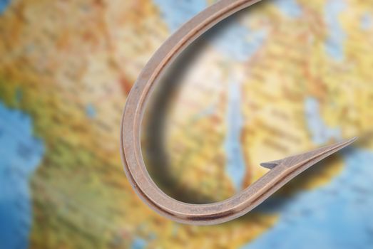 The fishing hook on a globe of the world- continent, Africa and the Peninsula Saudi Arabia 