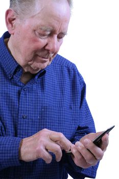 Elderly man using cell phone,dialing cell phne