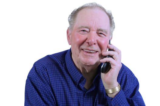 Elderly man using cell phone,talking on cell phne