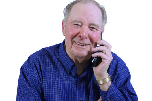 Elderly man using cell phone,talking on cell phne