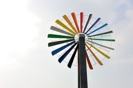 One colorful windmill under the blue sky