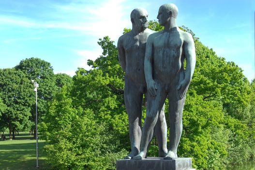 OSLO, NORWAY - May 28: sculptures of two naked males in Vigeland park in Oslo, Norway on May 28, 2008. installed in the park 212 bronze and granite sculptures created by Gustav Vigeland.