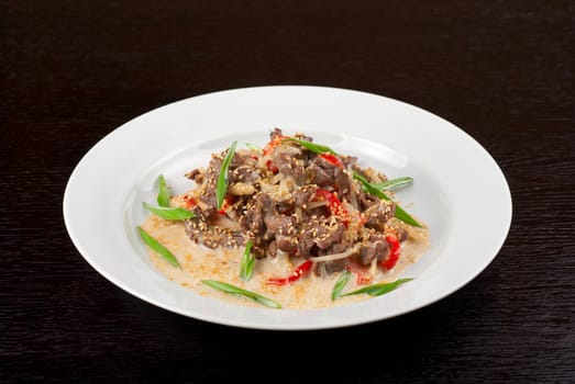 tasty dish of sliced beef roasted with vegetables