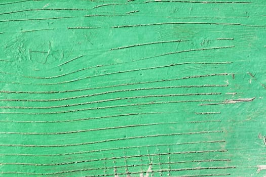 Detail of old wooden surface painted in green