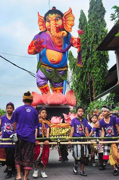 Ubud, Bali, Indonesia - March 12, 2013: Unidentified people taking part in celebration of Nyepi - Balinese Day of Silence . The day following Nyepi is also celebrated as New year.