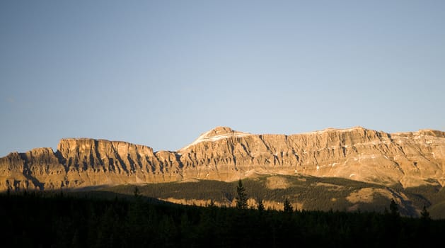 Golden Light On Mountains in Banff National Park