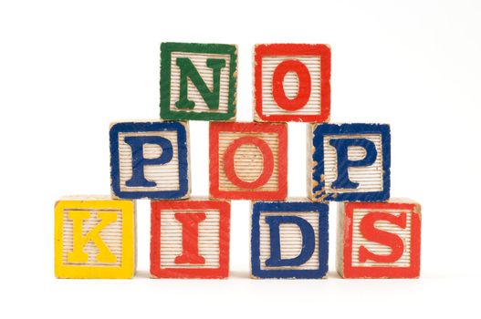 Children's wooden blocks spelling " No Pop Kids"