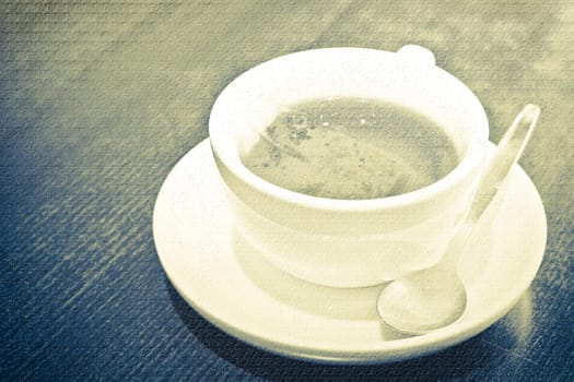 Etched textured monochrome image of a cup of tea brewing