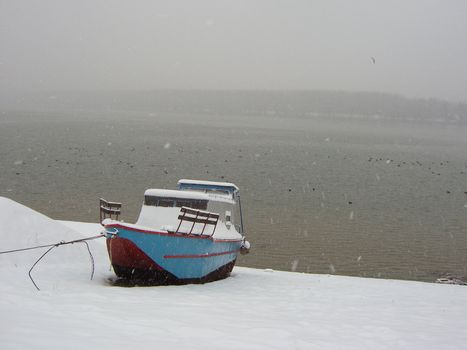 The boat on the shore of the river Danube near Belgrade (Serbia, the Balkans, Europe).