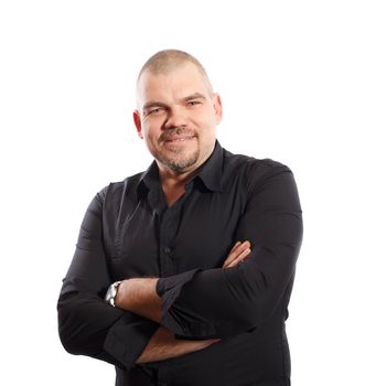 smiling, middle years man in black shirt on a white background