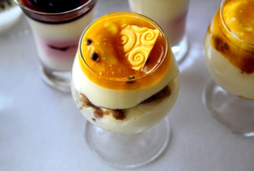 Sweet dessert with berries in a glass