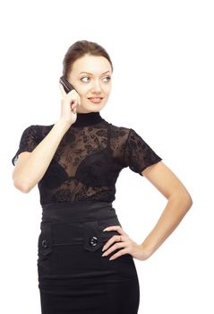 Smiling lady talking via cell phone and making hand akimbo on a white background