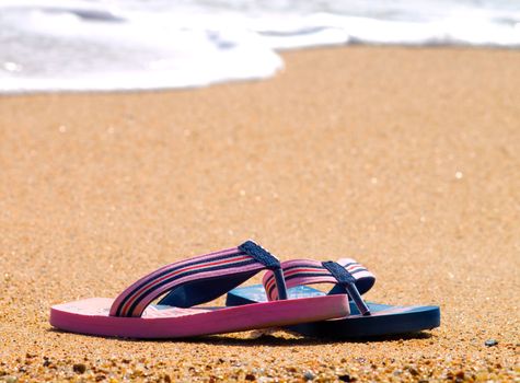 Slippers on the beach 