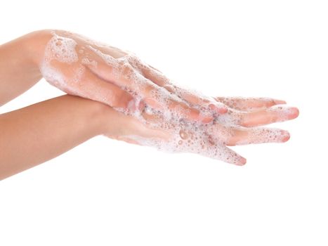 washing teenager hands isolated on white background 