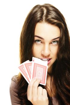 beautiful woman bites in a poker card on white background