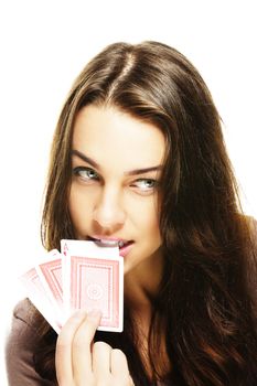 beautiful woman bites in a poker card on white background