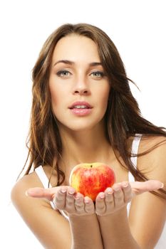 young woman presenting apple on white background