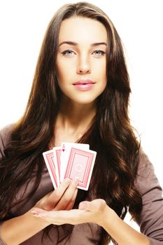 gorgeous woman presenting poker cards on white background