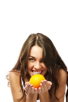 woman making faces behind a orange on white background