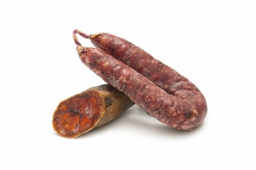 Iberian pork sausage acorn on white background