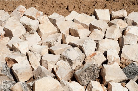 stones barricade to prevent landslides on a small yard