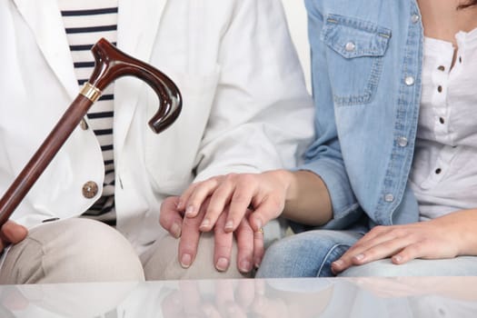 woman helping a senior