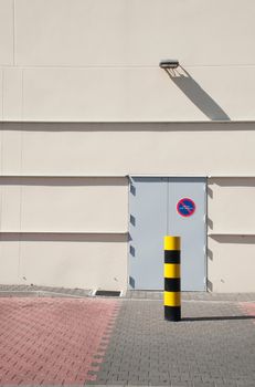 industrial warehouse with emergency exit door (parking vehicles is strictly forbidden)