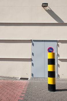 industrial warehouse with emergency exit door (parking vehicles is strictly forbidden)