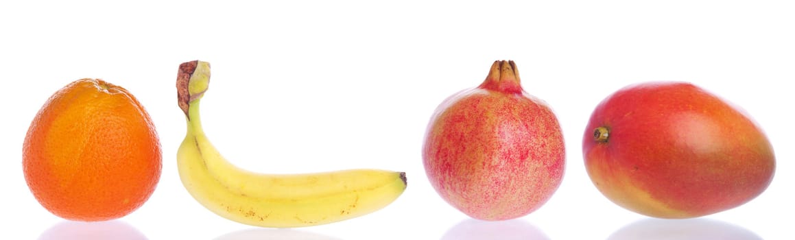 gorgeous fruits collection (orange, banana, pomegranate, mango) isolated on white background