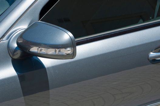 modern car blinker on a gray metallic sports car
