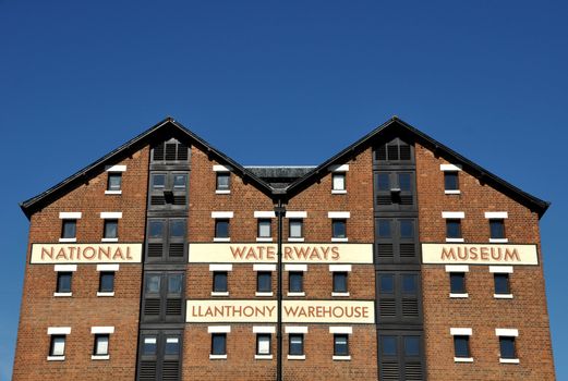 GLOUCESTER - AUGUST 30: 2010 National waterways museum on a warehouse building on August 30, 2010 in Gloucester docks, UK