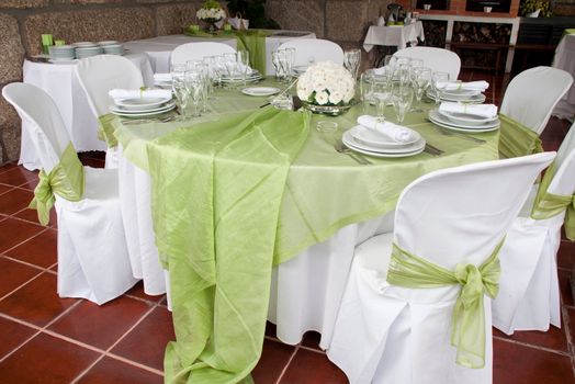 gorgeous wedding chair and table setting for fine dining at outdoors