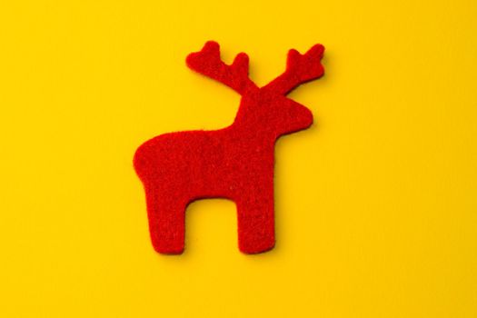 Reindeer isolated on the yellow background.