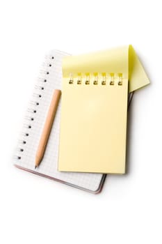 Notepad, pencil, isolated on white