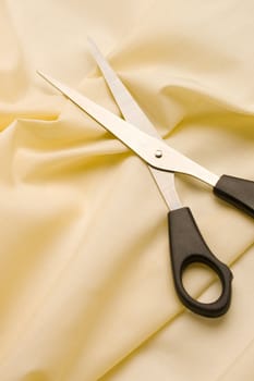 Textile background and scissors