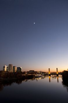 Sacramento California downtown in the evening. Tower bridge and skyline in view.