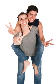 happy smiling sisters showing victory hand sign while playing together piggyback, isolated on white background