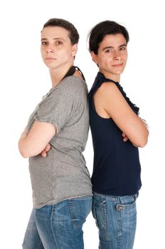 portrait of sisters who are upset with each other after a disagreement, isolated on white background