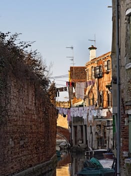 Image of a small hidden canal in Venice,Italy