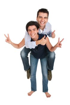 happy smiling brother and sister showing victory hand and thumbs up sign while playing together piggyback (full length picture, isolated on white background)